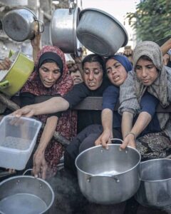 The Humanitarian Situation in Gaza; Palastien Childrens rushing for get a food for one time and crying with emotional heart break
