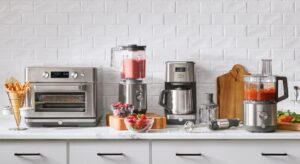 Best kitchen appliances that save time displayed on a modern kitchen countertop with an air fryer, blender, food processor, and coffee maker for efficient cooking.