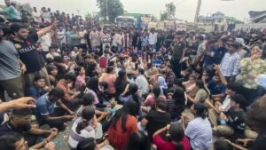 student protesting against the management asking for the rights. 