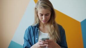 person using smartphone in everyday life
