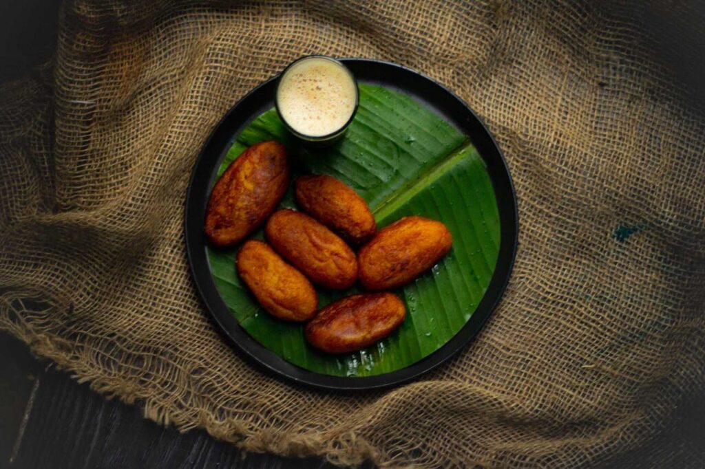 Unnakaya – a sweet banana delicacy filled with coconut and jaggery, showcasing the traditional flavors of Malabar