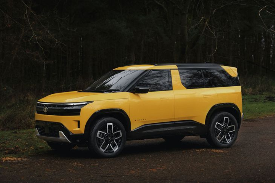 2025 Tata Sierra SUV exterior front view with futuristic LED headlights and panoramic sunroof